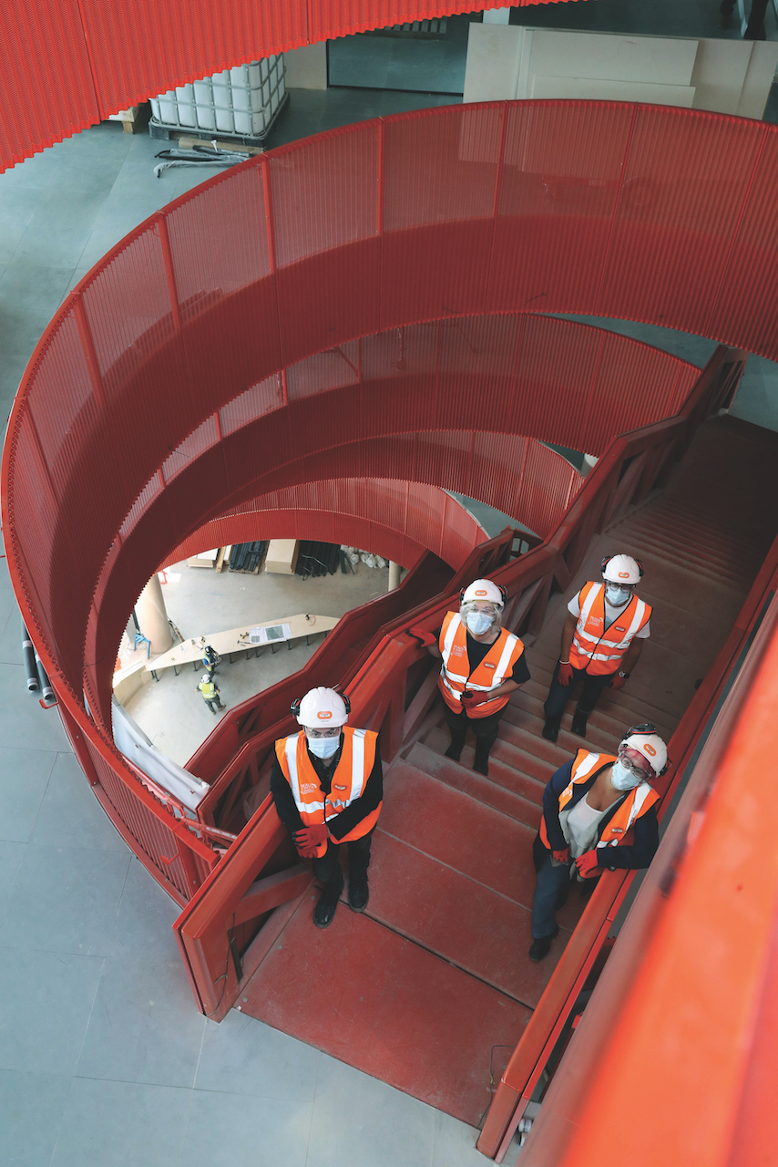 Staff pictured on Oculus staircase in sbarc/spark building