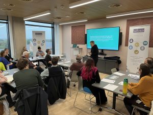 Professor Charles Sabel presenting to a room full of workshop participants