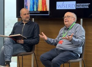 Marco Hauptmeier, Professor of Work and Employment and Pro Dean for Doctoral Studies at Cardiff Business School and Cardiff University Emeritus Professor, Mike Reed doing a Q&A session at the book launch.