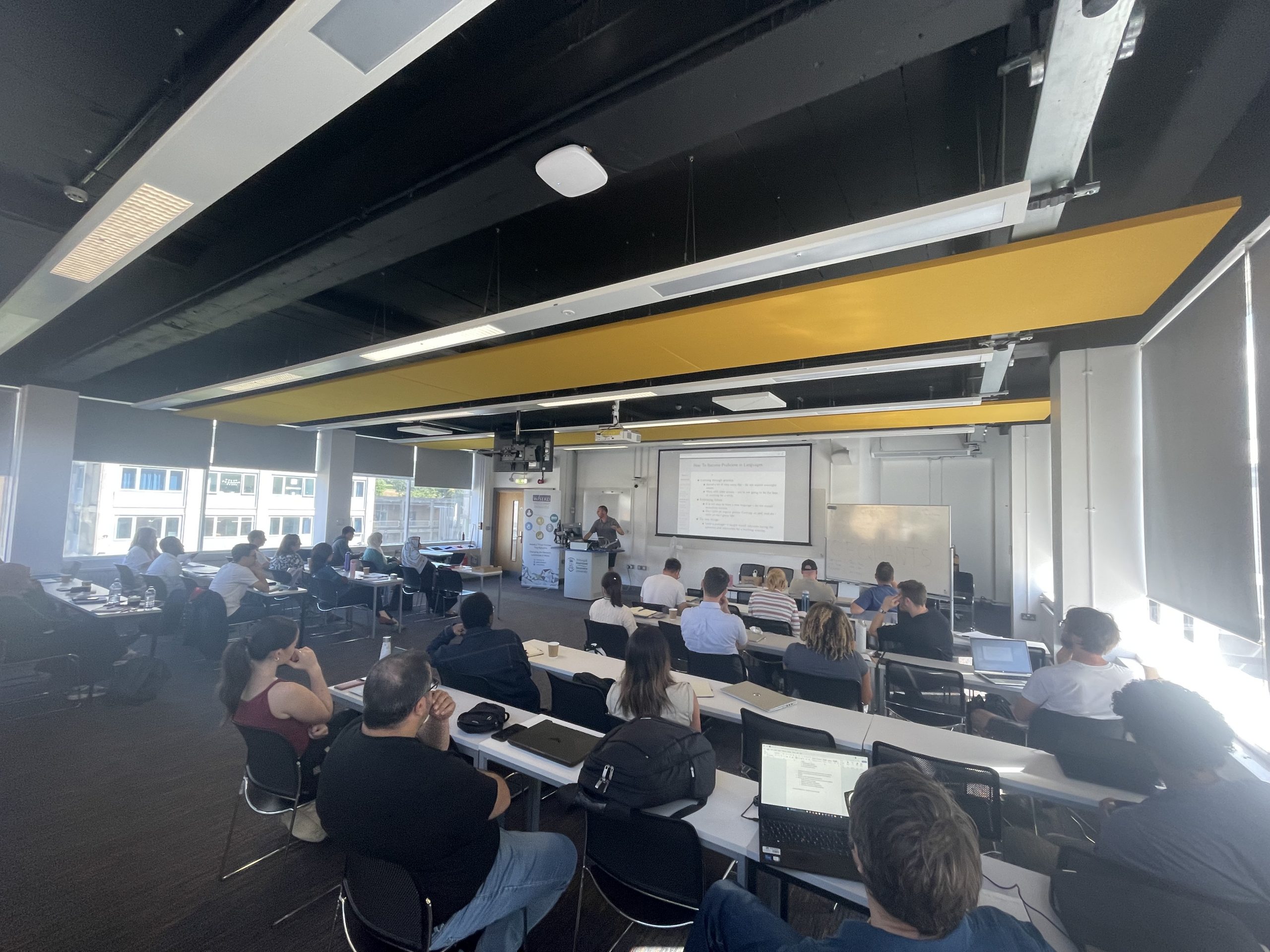 Participants in leacture theatre taking part in the Quantitative Methods Bootcamp.