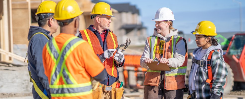 Group of people on building site