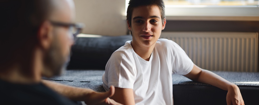 Young person talking with dad
