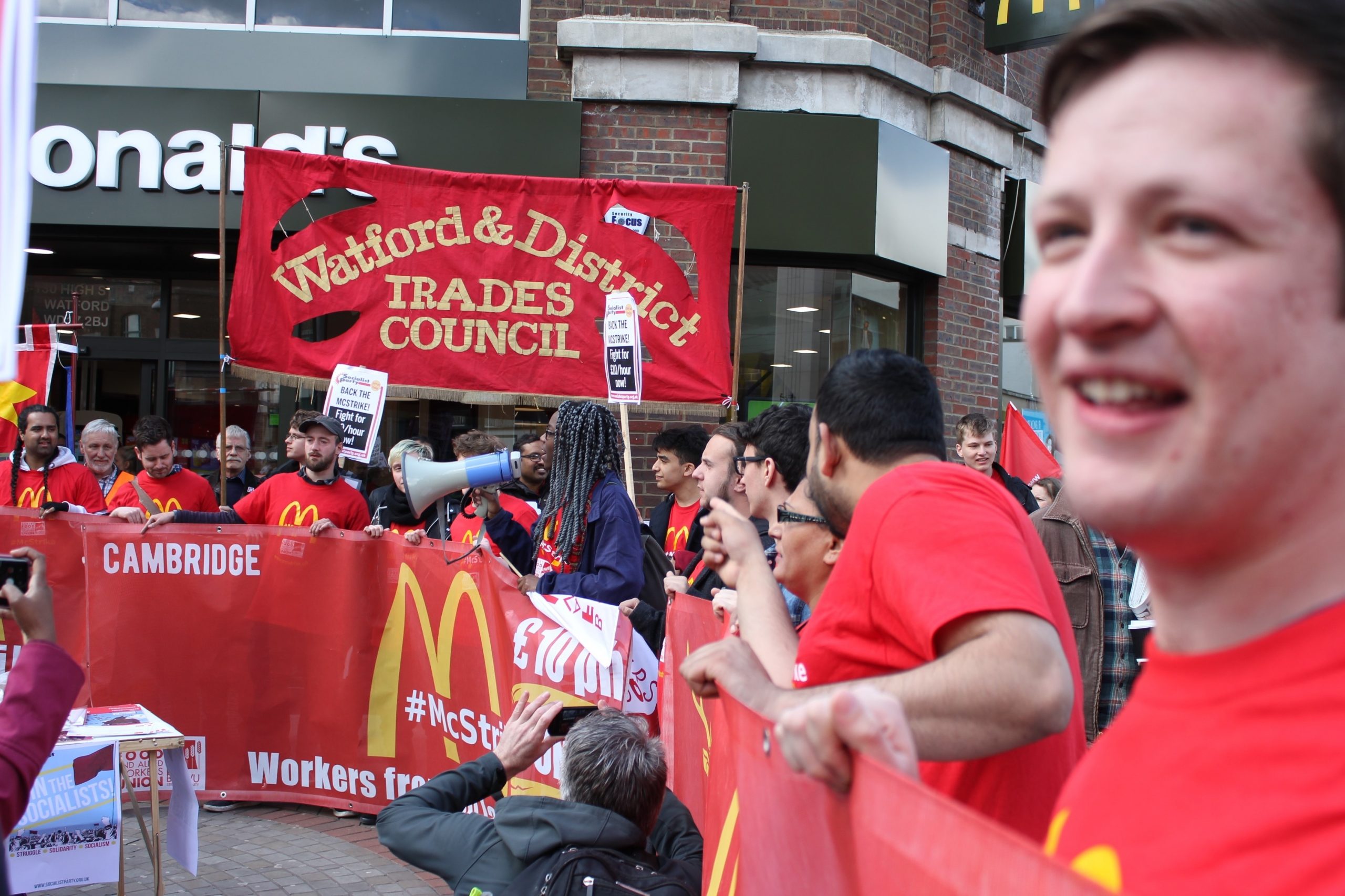 Striking workers from five McDonald’s gather on Watford High Street